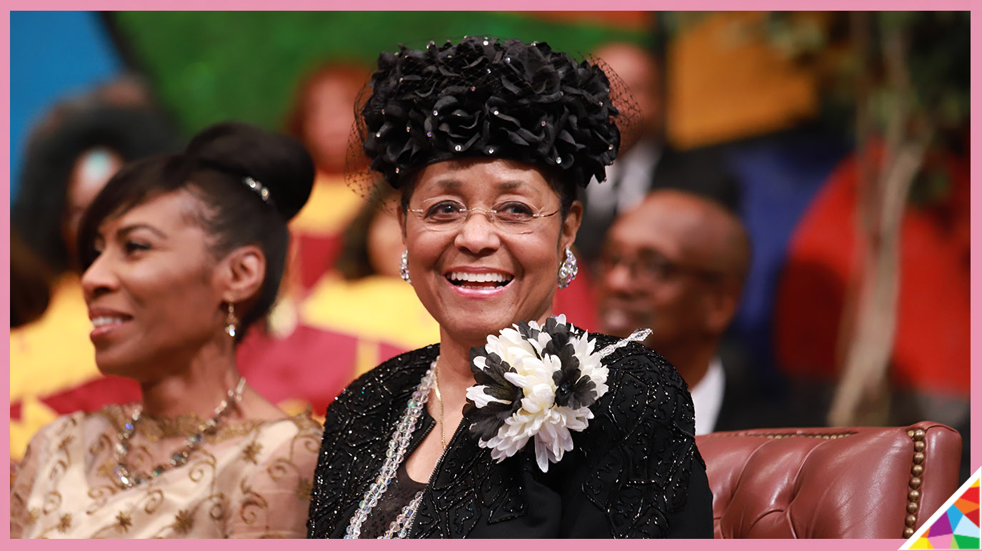 lady mae blake smiles from the altar with trenora parker in the background at west angeles COGIC